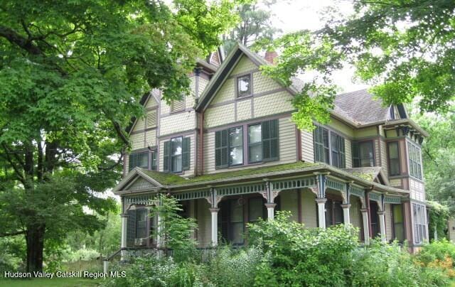 1896 County Rte 9, Chatham, NY 12037 - view of front facade with a porch