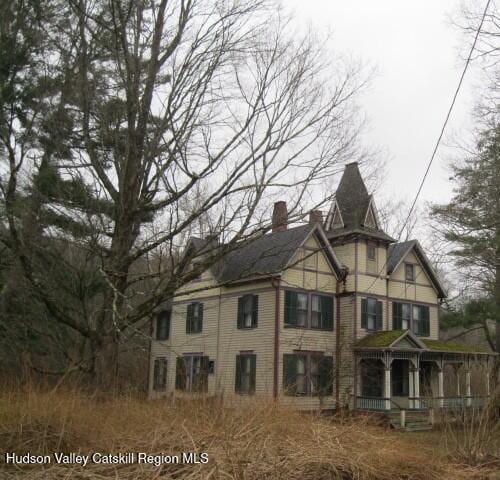 1896 County Rte 9, Chatham, NY 12037 - view of property exterior featuring a chimney and a porch