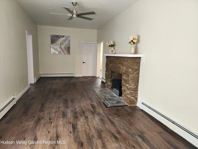 unfurnished living room featuring a fireplace, dark wood-type flooring, and a baseboard heating unit