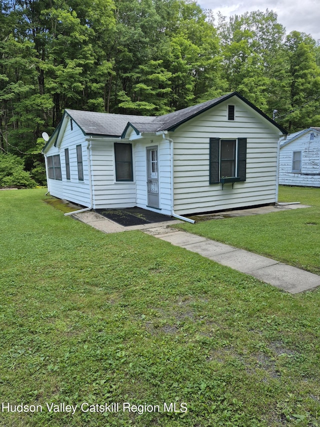 514 Upper Cherrytown Rd, Kerhonkson, NY 12446 - single story home with a front lawn and a shingled roof