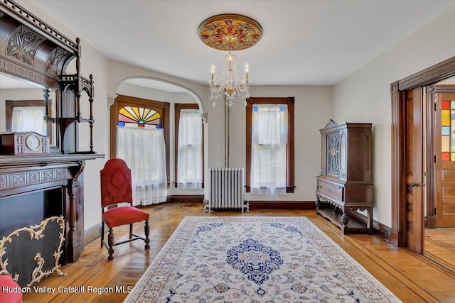 4930 State Route 81, Greenville, NY 12083 - sitting room with radiator heating unit, a chandelier, healthy amount of natural light, and baseboards