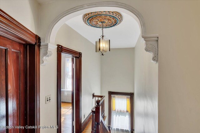 4930 State Route 81, Greenville, NY 12083 - hall featuring plenty of natural light, arched walkways, an upstairs landing, and vaulted ceiling