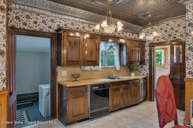 4930 State Route 81, Greenville, NY 12083 - kitchen featuring dishwasher, a sink, light countertops, a chandelier, and decorative backsplash
