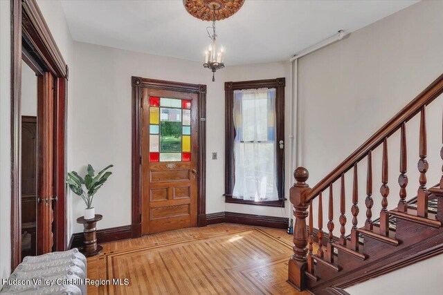 4930 State Route 81, Greenville, NY 12083 - foyer featuring stairs, baseboards, and light wood-style flooring