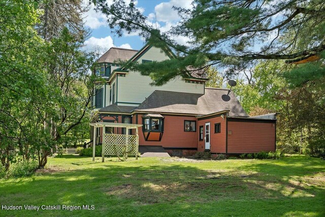 4930 State Route 81, Greenville, NY 12083 - back of house featuring a yard and roof with shingles