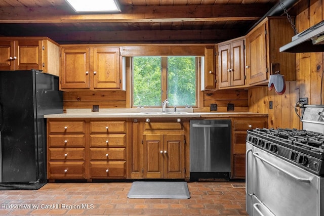 340 Lower Cady Rd, Old Chatham, NY 12136 - kitchen with appliances with stainless steel finishes, a wooden ceiling with exposed beams, ventilation hood, brown cabinets, and light countertops
