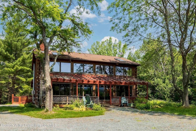 340 Lower Cady Rd, Old Chatham, NY 12136 - view of front of home featuring log siding and covered porch