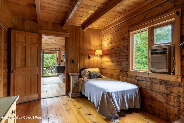 340 Lower Cady Rd, Old Chatham, NY 12136 - bedroom with light wood finished floors, a wooden ceiling with exposed beams, wooden walls, and cooling unit