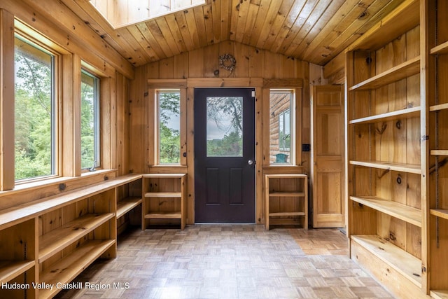 340 Lower Cady Rd, Old Chatham, NY 12136 - entrance foyer with lofted ceiling, plenty of natural light, a skylight, and wooden walls