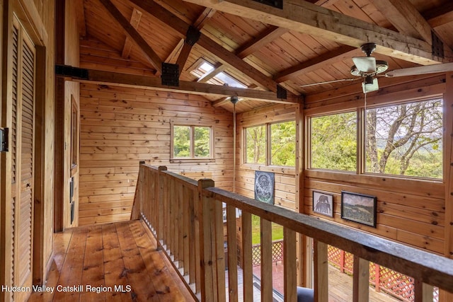 340 Lower Cady Rd, Old Chatham, NY 12136 - hall with wood walls, wood ceiling, light wood finished floors, and an upstairs landing