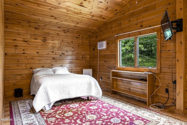 340 Lower Cady Rd, Old Chatham, NY 12136 - bedroom with lofted ceiling, an AC wall unit, and wooden walls