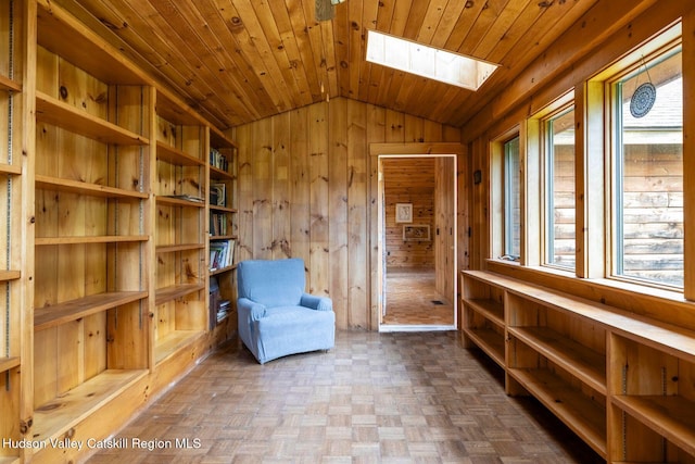 340 Lower Cady Rd, Old Chatham, NY 12136 - sitting room with vaulted ceiling, wooden walls, a skylight, and wood ceiling