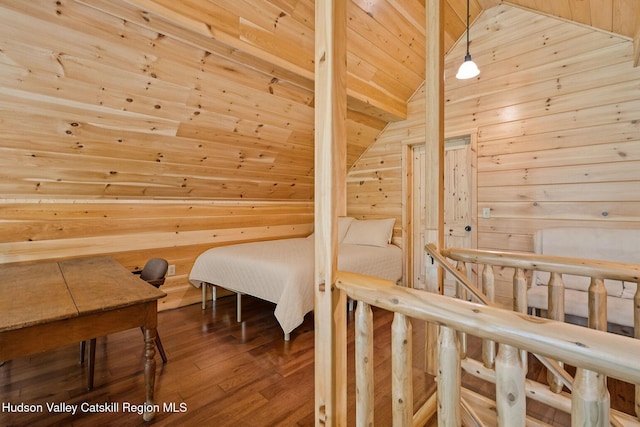111 Ridgeway, Catskill, NY 12414 - bedroom with vaulted ceiling, wood walls, wooden ceiling, and hardwood / wood-style flooring