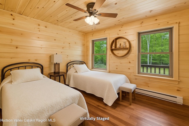111 Ridgeway, Catskill, NY 12414 - bedroom with baseboard heating, wood ceiling, wood walls, and wood finished floors