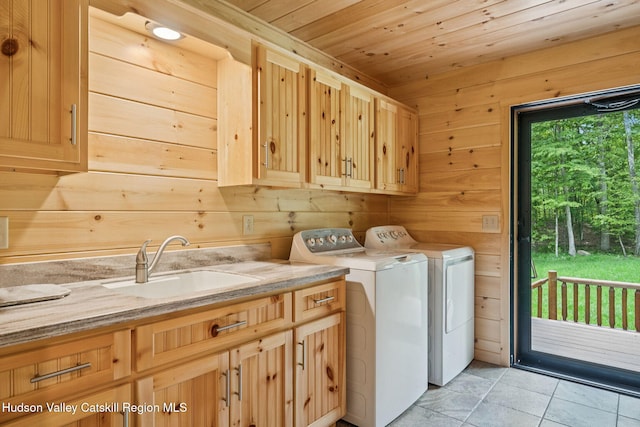 111 Ridgeway, Catskill, NY 12414 - laundry area with cabinet space, washer and dryer, wooden ceiling, wood walls, and light tile patterned floors