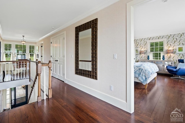 470 Harrington Dr, Austerlitz, NY 12017 - corridor with an upstairs landing, hardwood / wood-style floors, baseboards, crown molding, and wallpapered walls