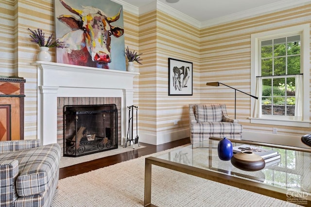 470 Harrington Dr, Austerlitz, NY 12017 - living room with wood finished floors, crown molding, and a brick fireplace