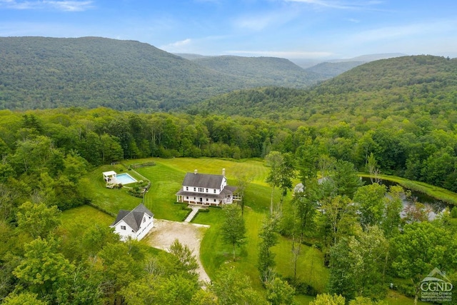 470 Harrington Dr, Austerlitz, NY 12017 - aerial view of property and surrounding area with a heavily wooded area and mountains