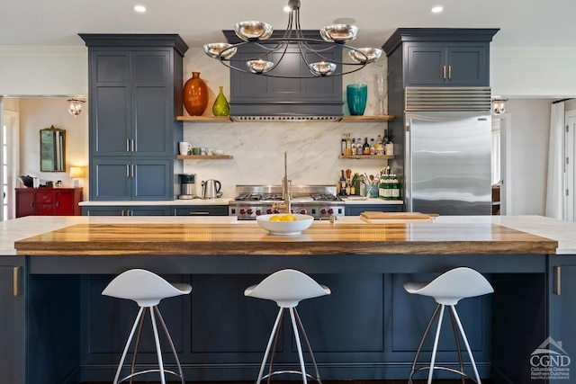 470 Harrington Dr, Austerlitz, NY 12017 - kitchen featuring stainless steel built in fridge, stove, open shelves, blue cabinetry, and recessed lighting