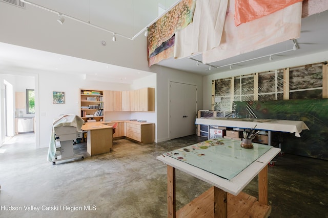 1114 County Route 3, Ancram, NY 12502 - kitchen featuring light brown cabinetry, concrete flooring, light countertops, a kitchen island, and dishwasher