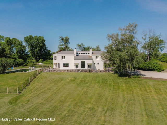 1114 County Route 3, Ancram, NY 12502 - view of front of house with stucco siding and a chimney