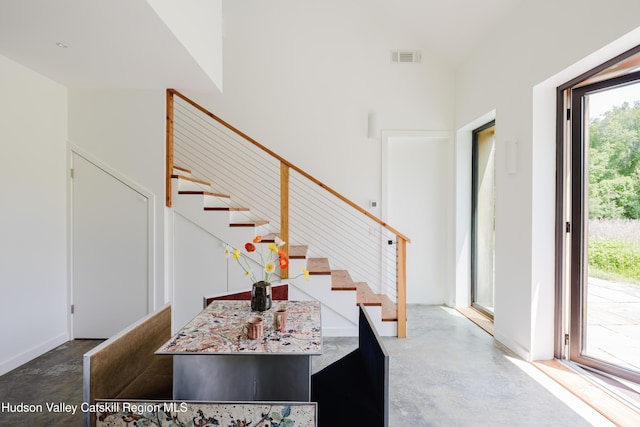 1114 County Route 3, Ancram, NY 12502 - entryway with finished concrete flooring and stairway