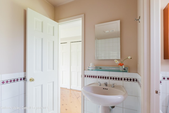 1114 County Route 3, Ancram, NY 12502 - bathroom with tile walls, wainscoting, and wood finished floors