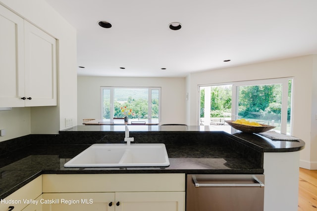 1114 County Route 3, Ancram, NY 12502 - kitchen with white cabinets, light wood finished floors, recessed lighting, dishwasher, and a peninsula