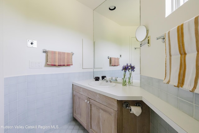 1114 County Route 3, Ancram, NY 12502 - bathroom with vanity, tile walls, wainscoting, and tile patterned flooring