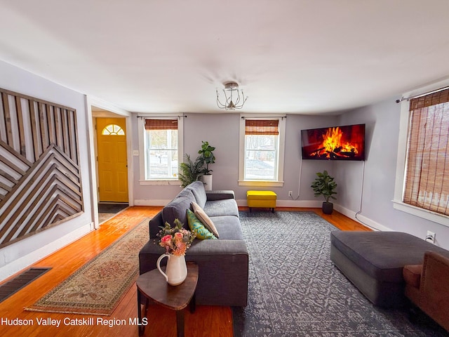 living room with wood finished floors and baseboards