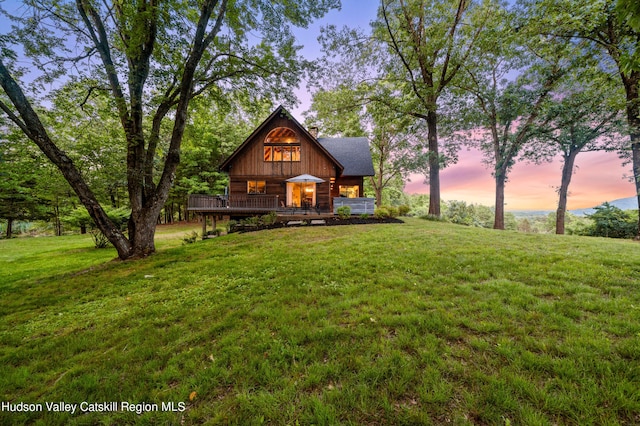 exterior space featuring a lawn