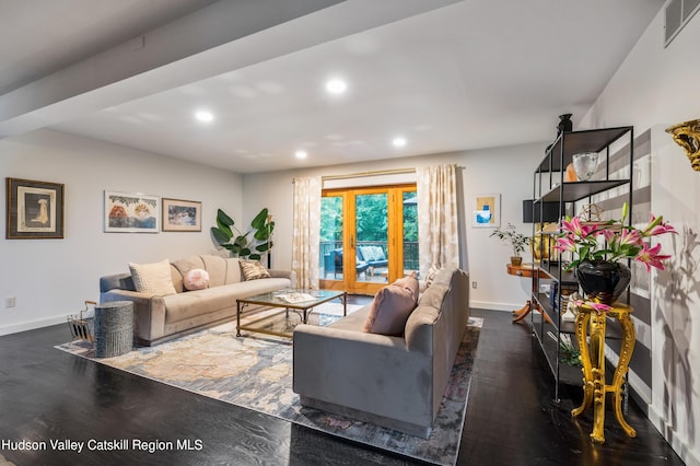 living room featuring dark hardwood / wood-style flooring