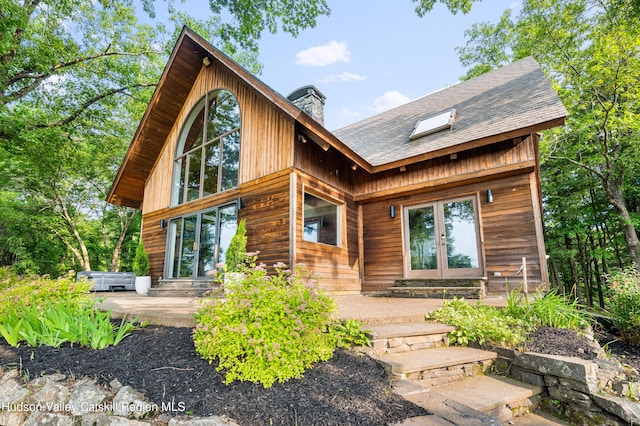 view of front of home featuring a patio area and french doors