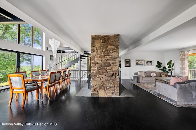 dining area with hardwood / wood-style floors and a wealth of natural light