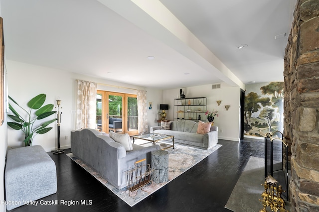 living room with dark hardwood / wood-style floors