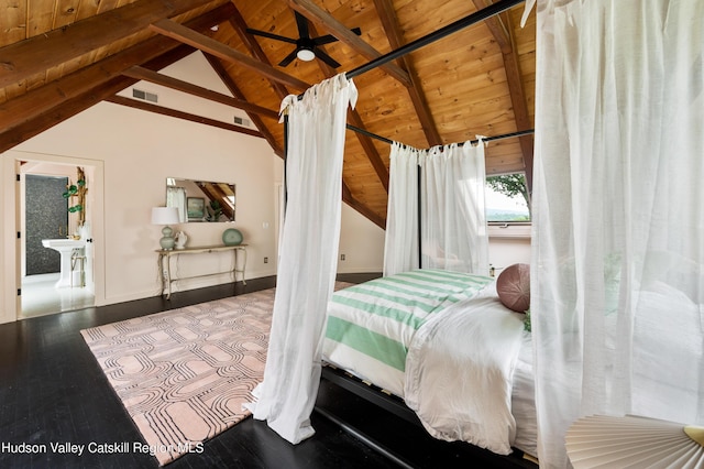 bedroom with vaulted ceiling with beams, wood ceiling, and hardwood / wood-style flooring
