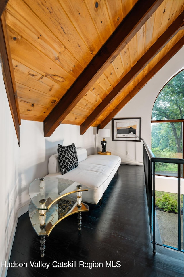 bedroom featuring lofted ceiling with beams, wooden ceiling, dark wood-type flooring, and access to outside