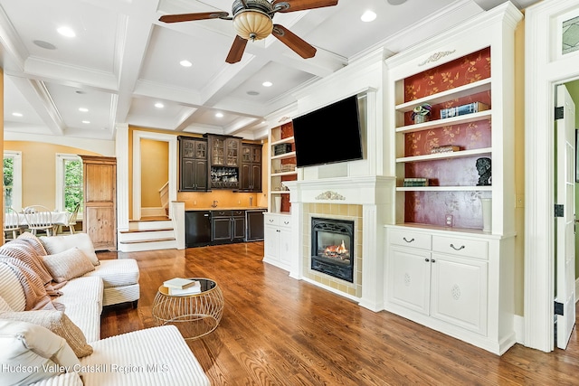 125 Bedell Rd, Poughkeepsie Town, NY 12603 - living area with ornamental molding, wood finished floors, ceiling fan, bar, and beamed ceiling