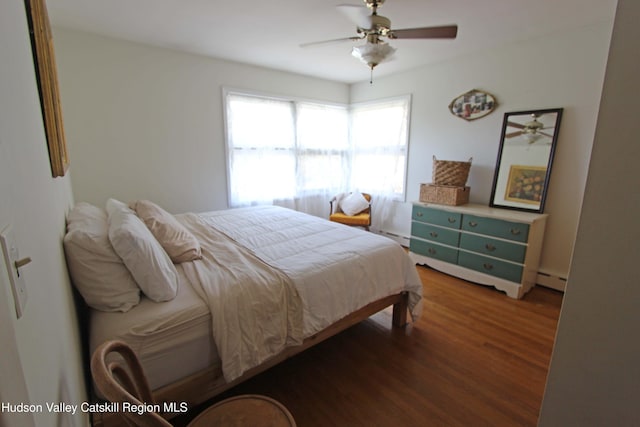 171 State Route 208, New Paltz, NY 12561 - bedroom featuring a baseboard radiator, wood finished floors, and ceiling fan
