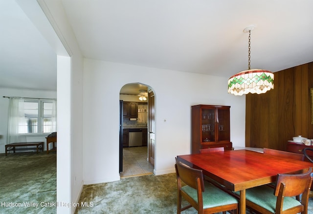 view of carpeted dining area