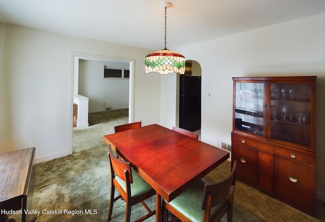 view of carpeted dining room