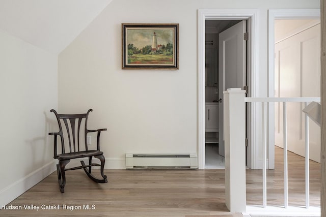 55 Ginger Rd, High Falls, NY 12440 - living area with a baseboard heating unit, wood finished floors, lofted ceiling, and baseboards