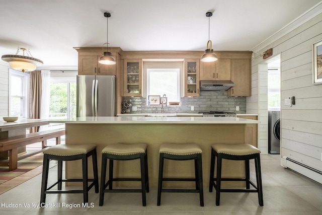 55 Ginger Rd, High Falls, NY 12440 - kitchen with freestanding refrigerator, washer / dryer, under cabinet range hood, backsplash, and light countertops