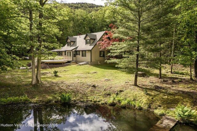 55 Ginger Rd, High Falls, NY 12440 - back of property featuring a wooden deck, a view of trees, and a yard