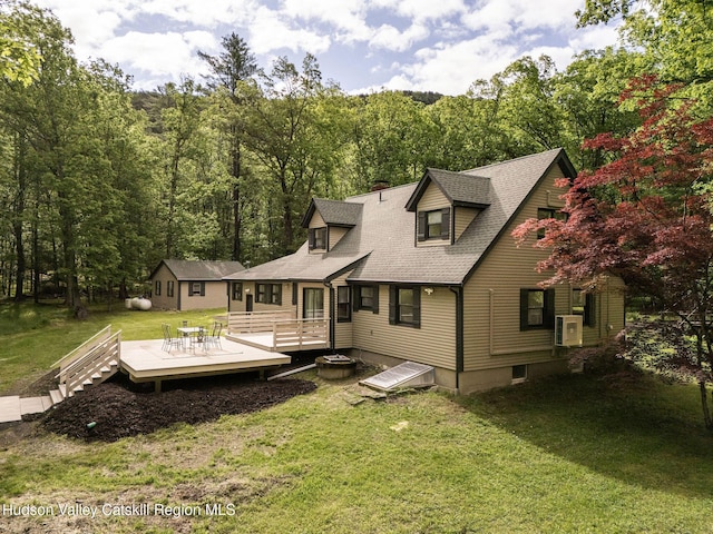 55 Ginger Rd, High Falls, NY 12440 - rear view of property featuring a wooden deck, a yard, a shingled roof, a cooling unit, and a view of trees