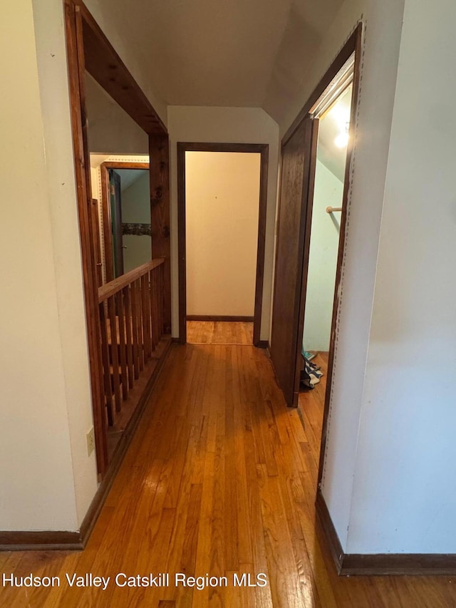 50 Payn Ave, Chatham, NY 12037 - corridor with wood-type flooring and vaulted ceiling