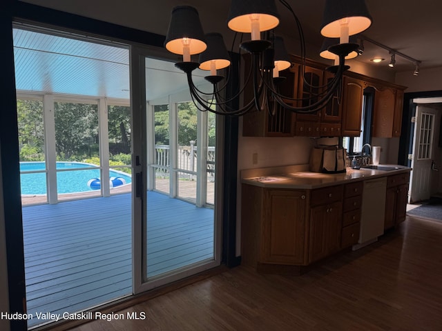 50 Payn Ave, Chatham, NY 12037 - kitchen with track lighting, a chandelier, dark wood finished floors, and plenty of natural light