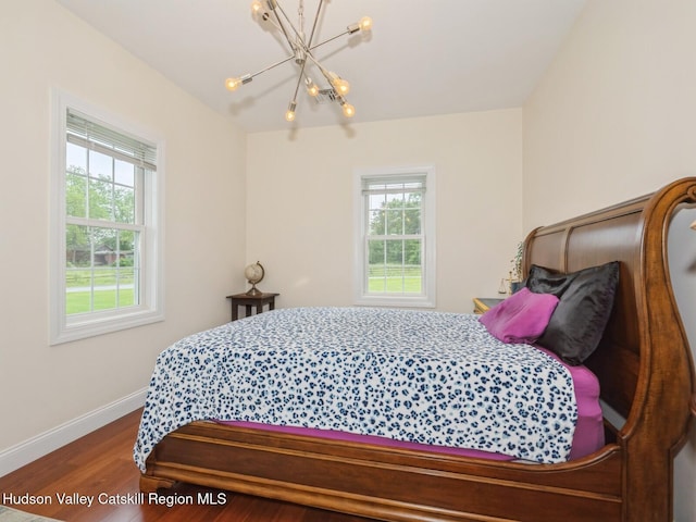 40 Bridle Path Ln, High Falls, NY 12440 - bedroom featuring a chandelier and wood finished floors
