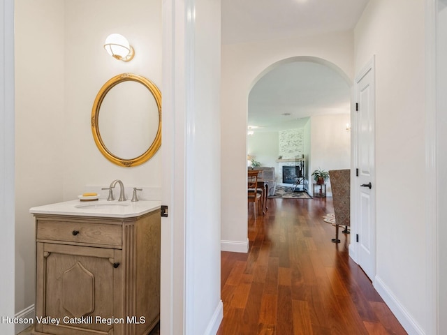 40 Bridle Path Ln, High Falls, NY 12440 - hall with arched walkways and dark wood-style floors