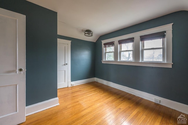 2 W Marie St, Hudson, NY 12534 - unfurnished room featuring lofted ceiling, light wood-type flooring, and baseboards